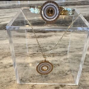 Elegant Gold and Silver Pendant Necklace